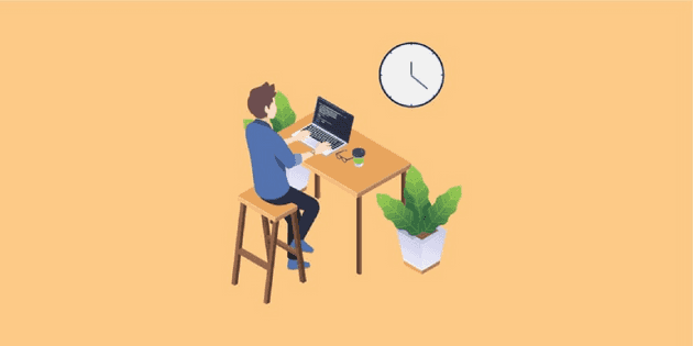 man sitting with his laptop on table